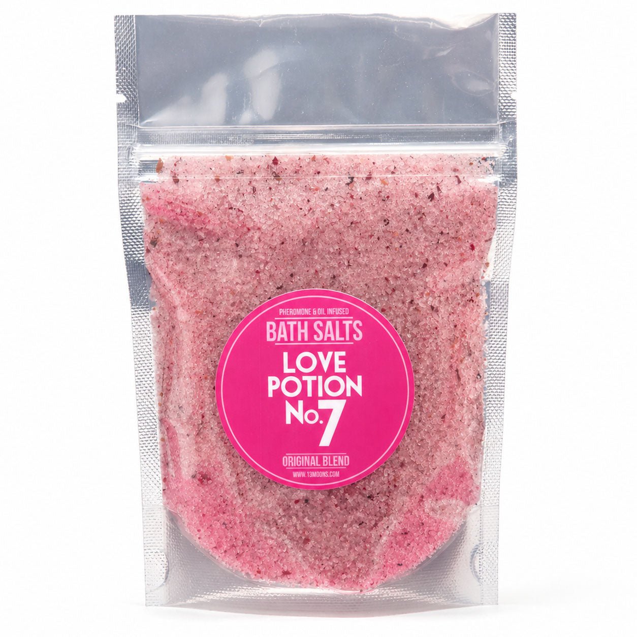 Pink bath salts in a clear packaging with a pink label on a white background