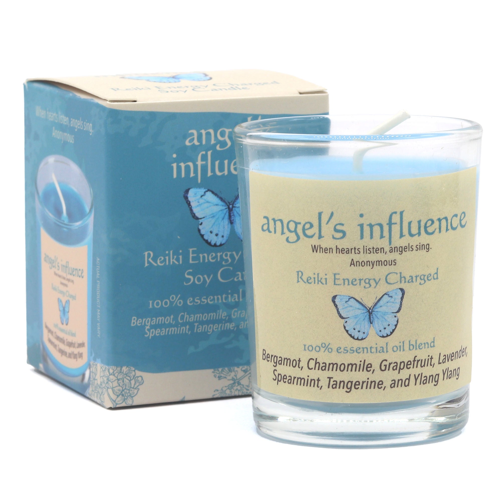 Candle labeled 'angel's influence' with packaging in the background
