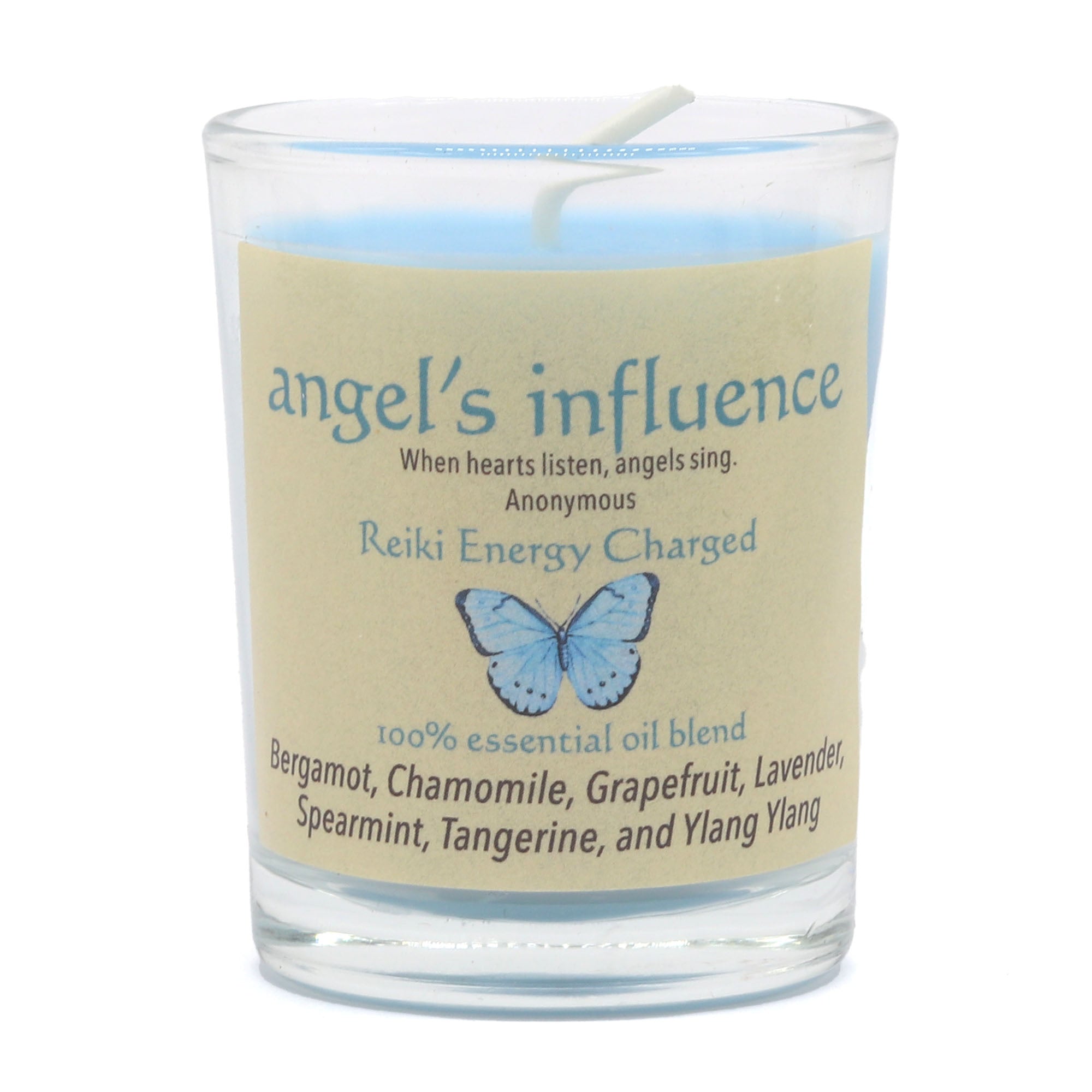 Candle with a label featuring 'angel's influence' and a blue butterfly on a beige background.