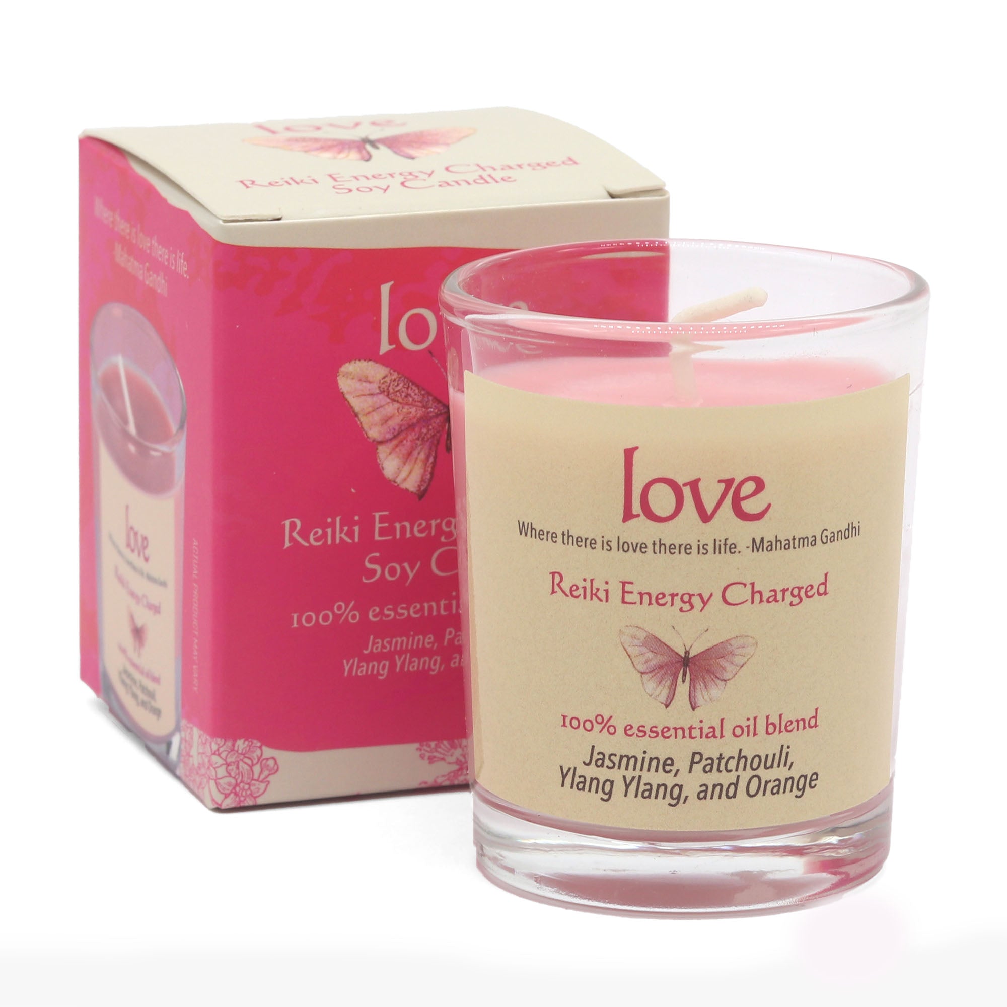 Pink Reiki Energy Charged candle with packaging on a white background
