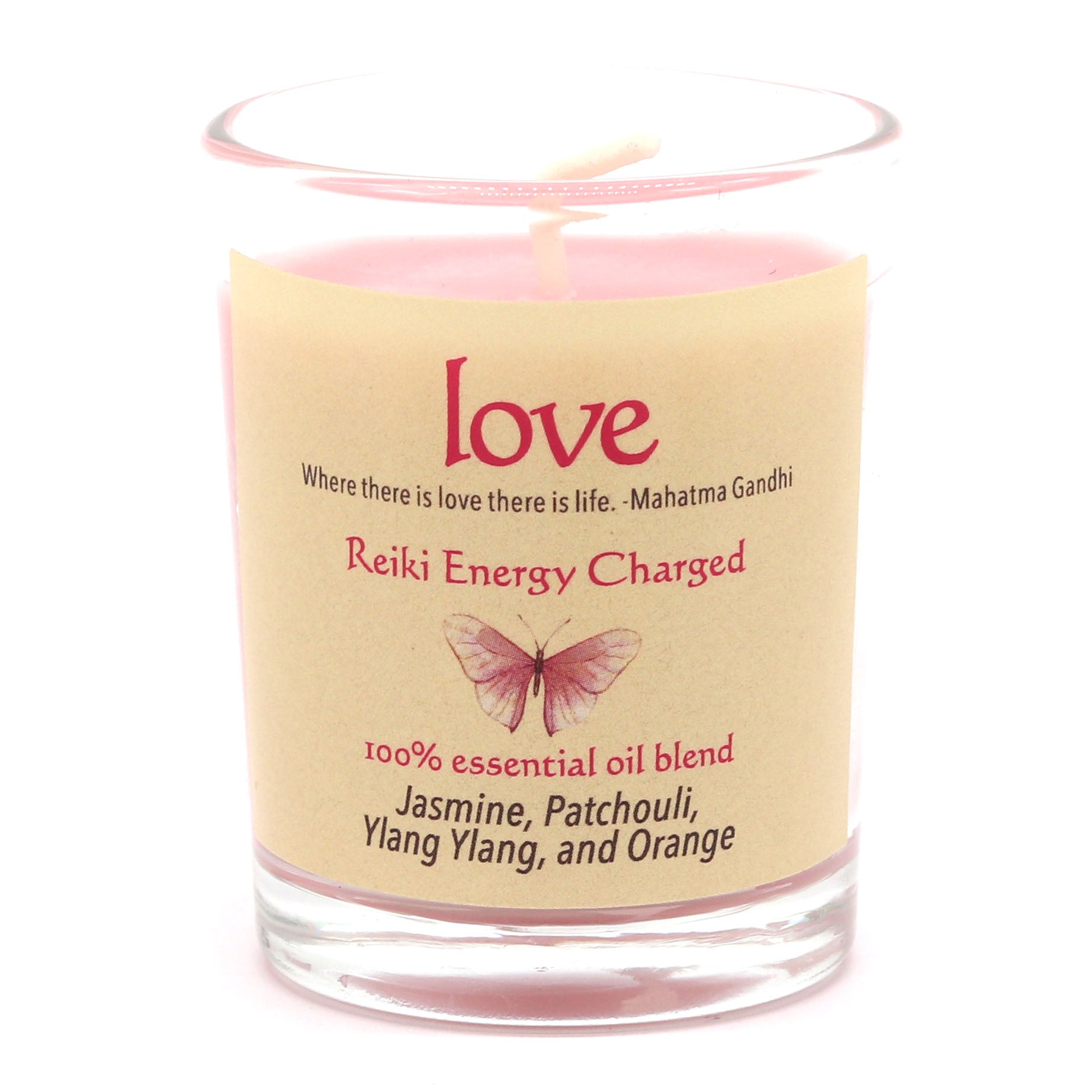 Candle with a label featuring text and a butterfly illustration on a white background