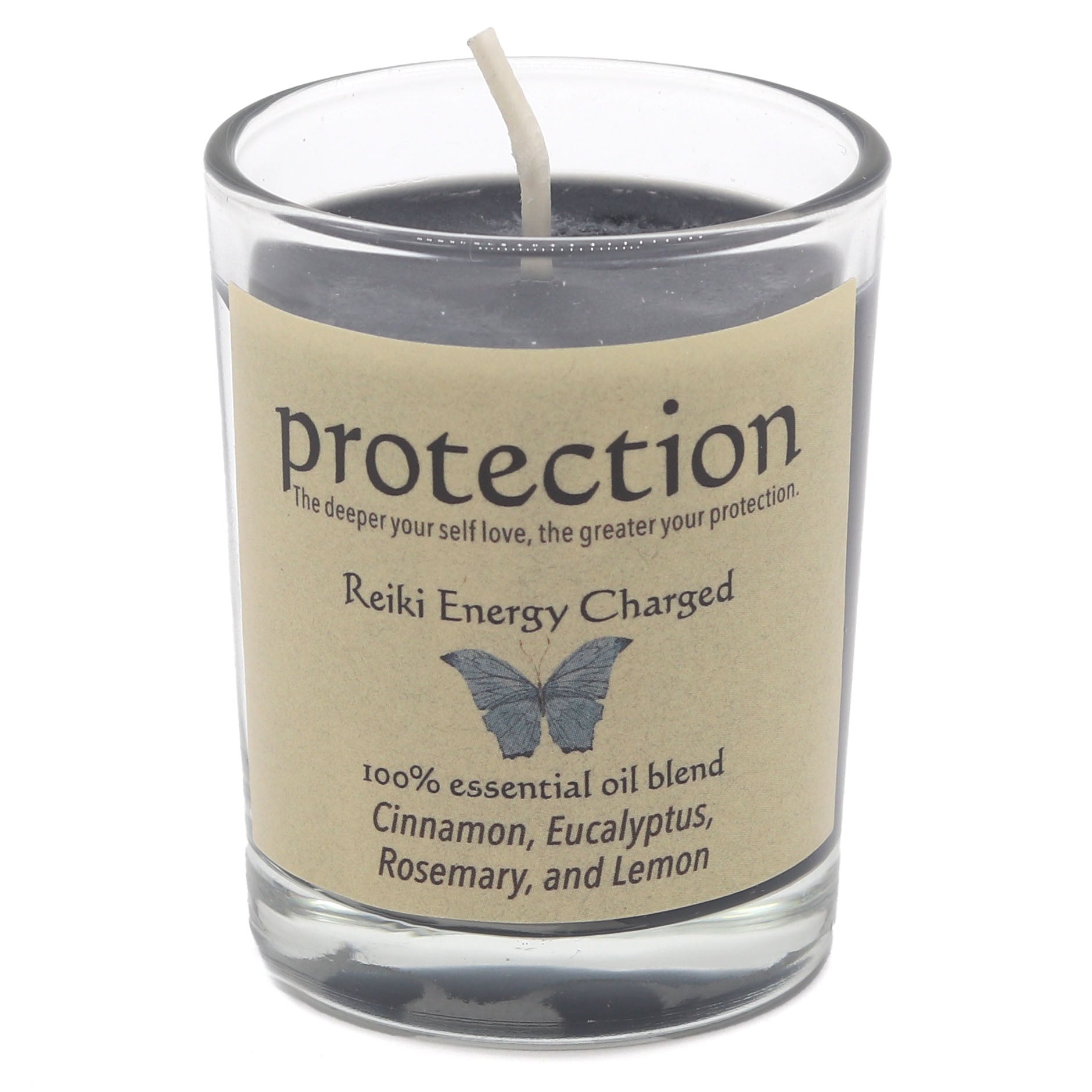Candle in a glass jar with a label stating 'protection' and 'Reiki Energy Charged'.