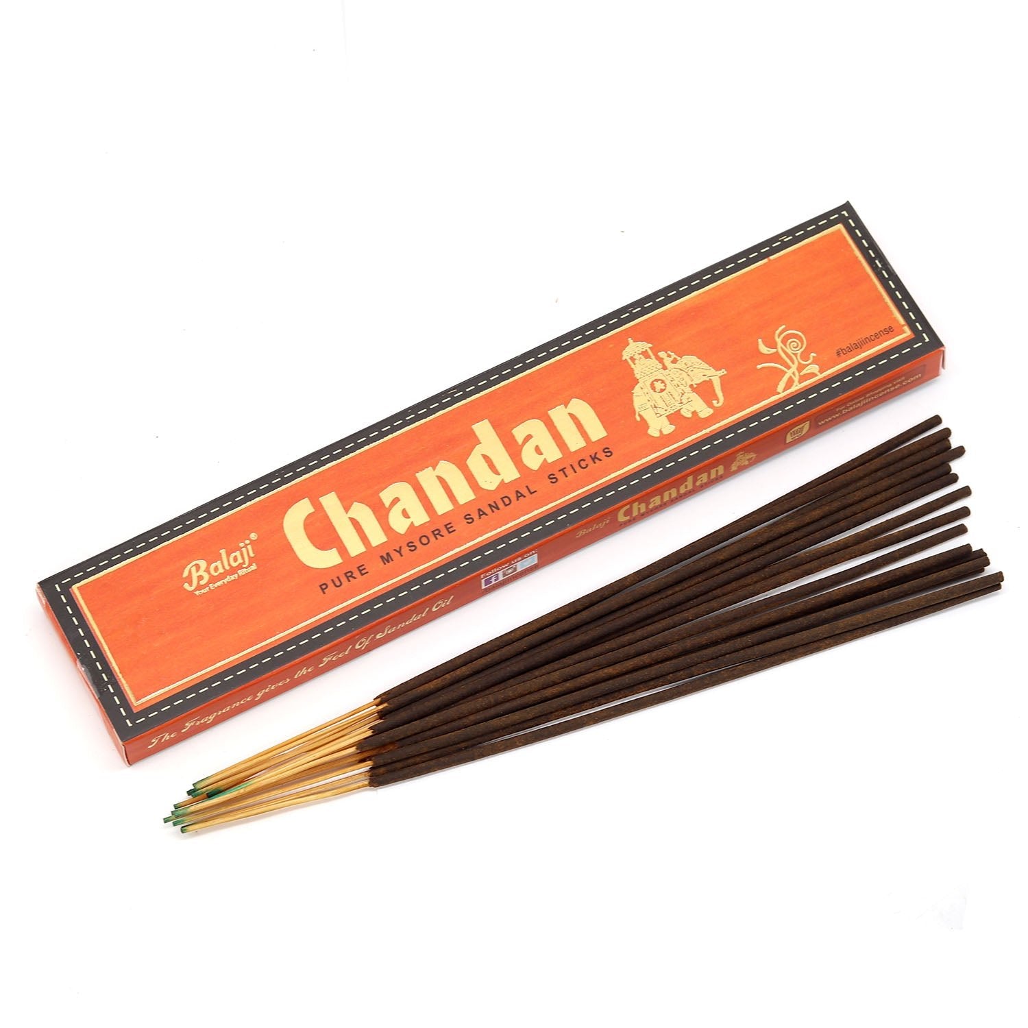 Box of Chandan incense sticks with incense sticks in front on a white background