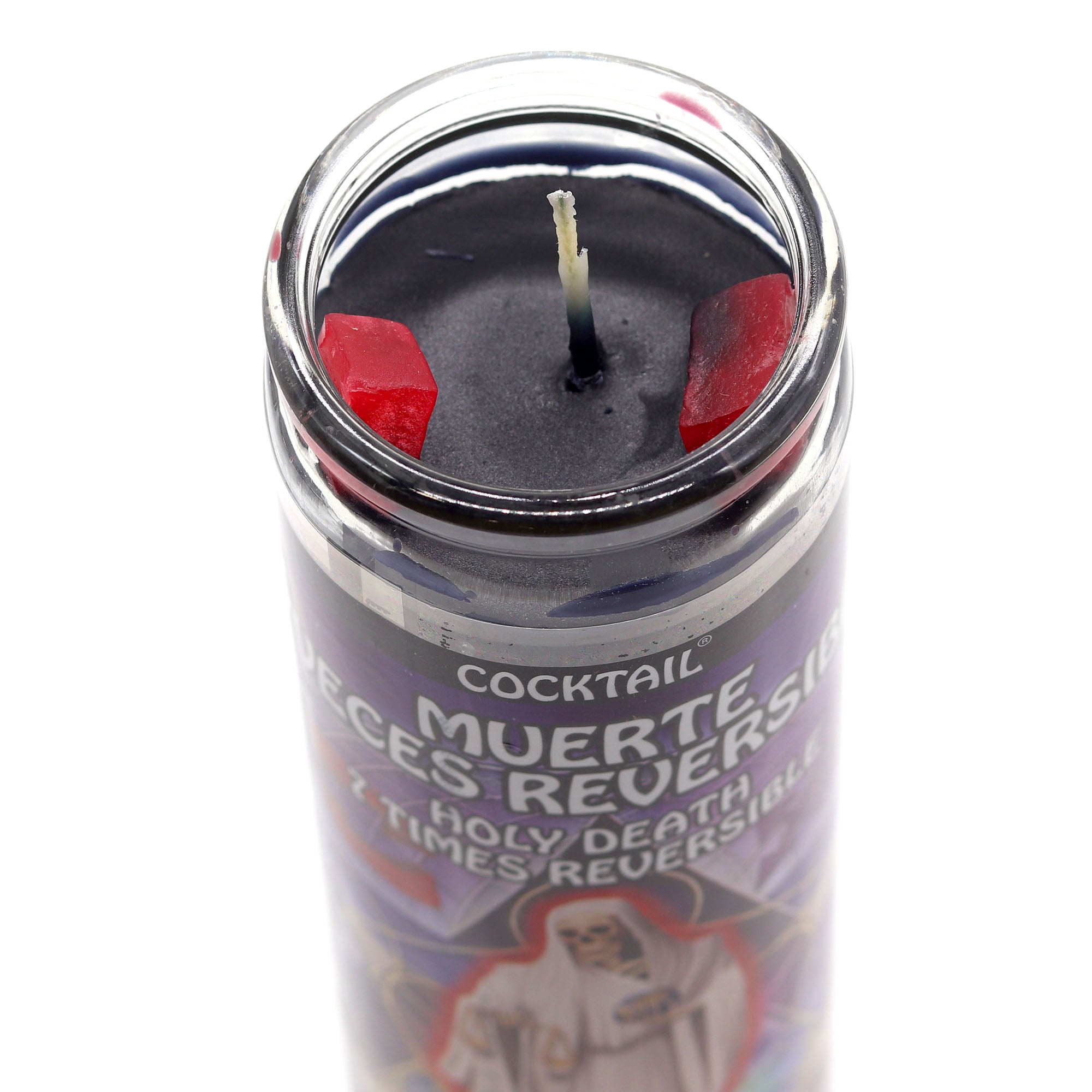 Candle in a glass container with a label on a white background