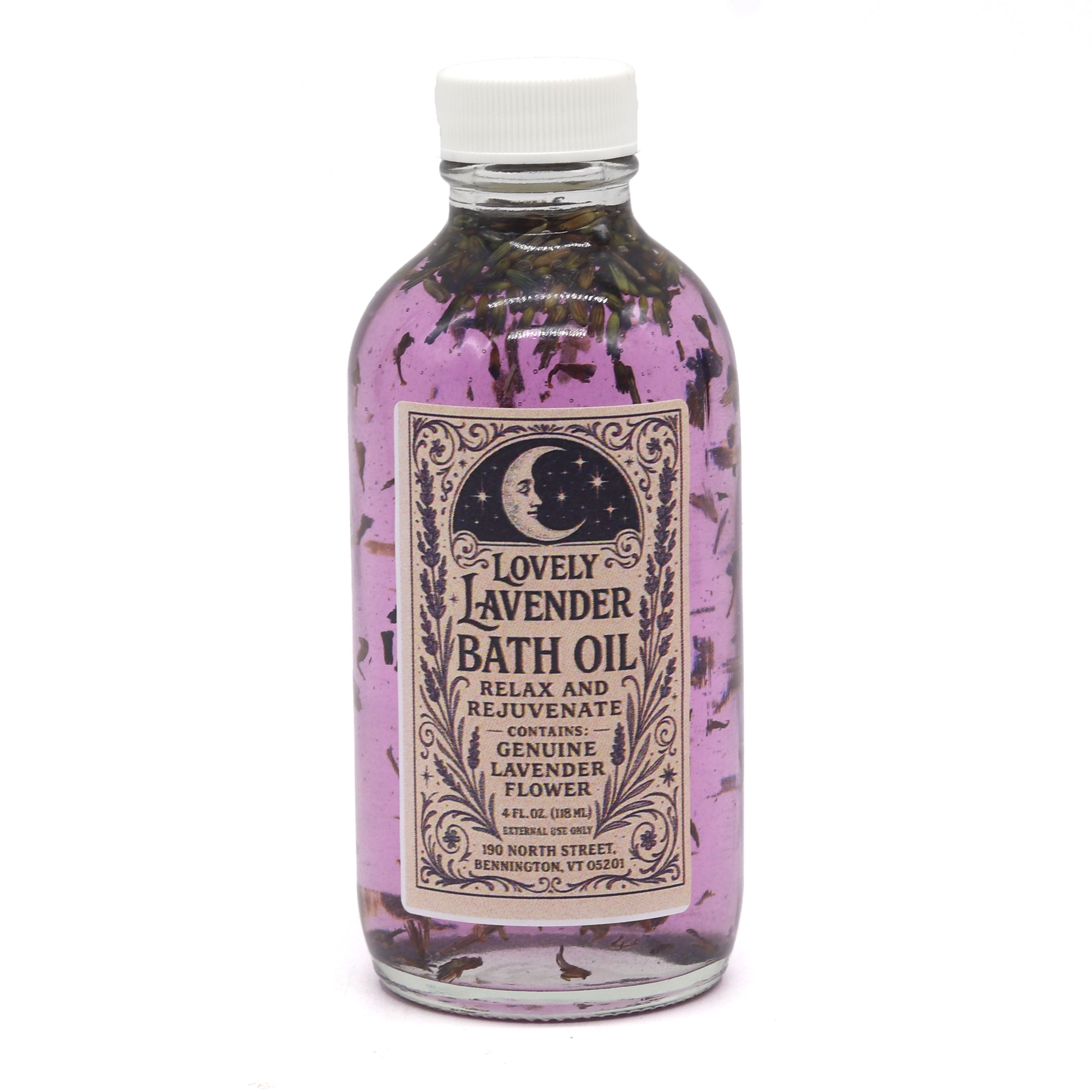 Bottle of lavender bath oil with a decorative label on a white background