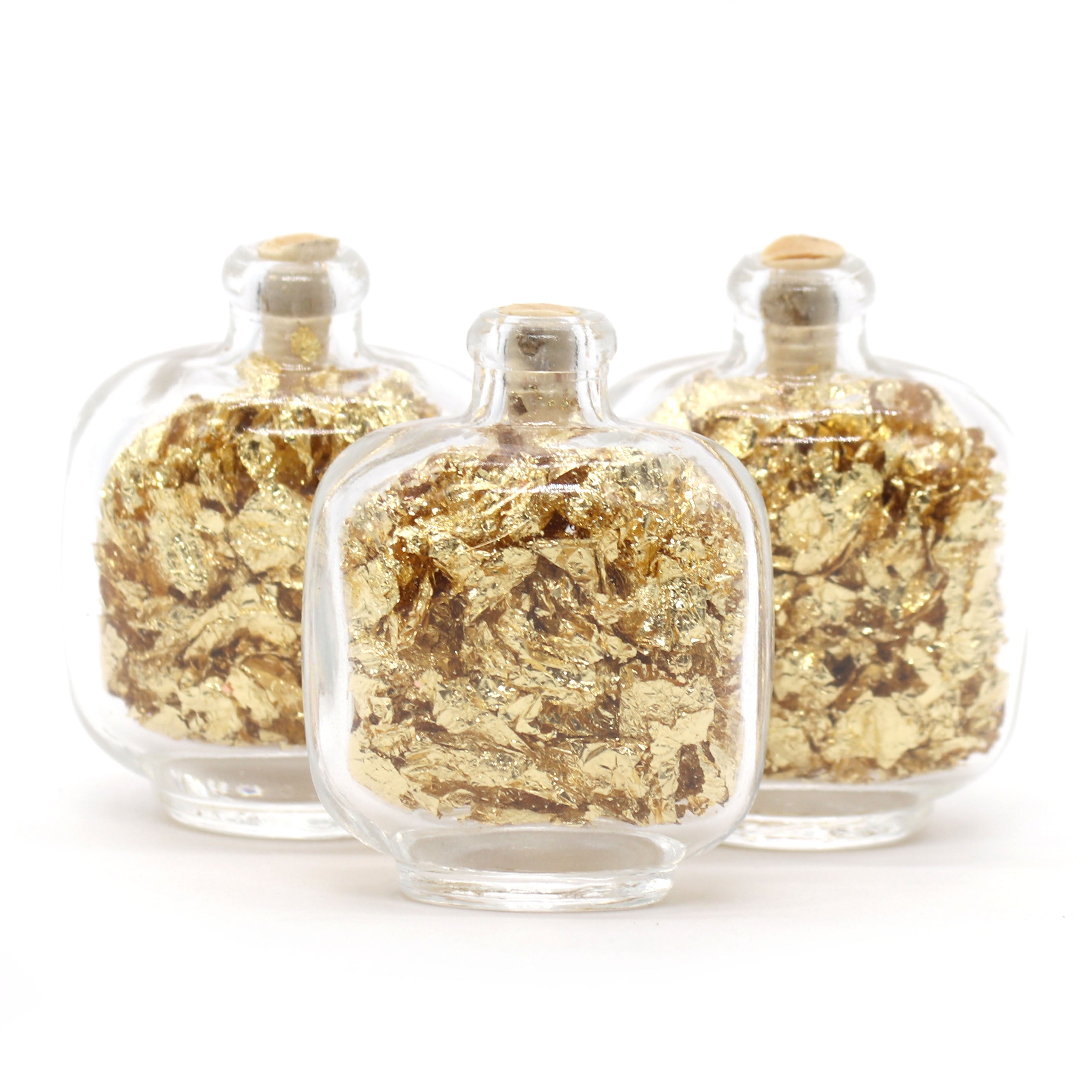 Gold Flakes in Glass Bottle