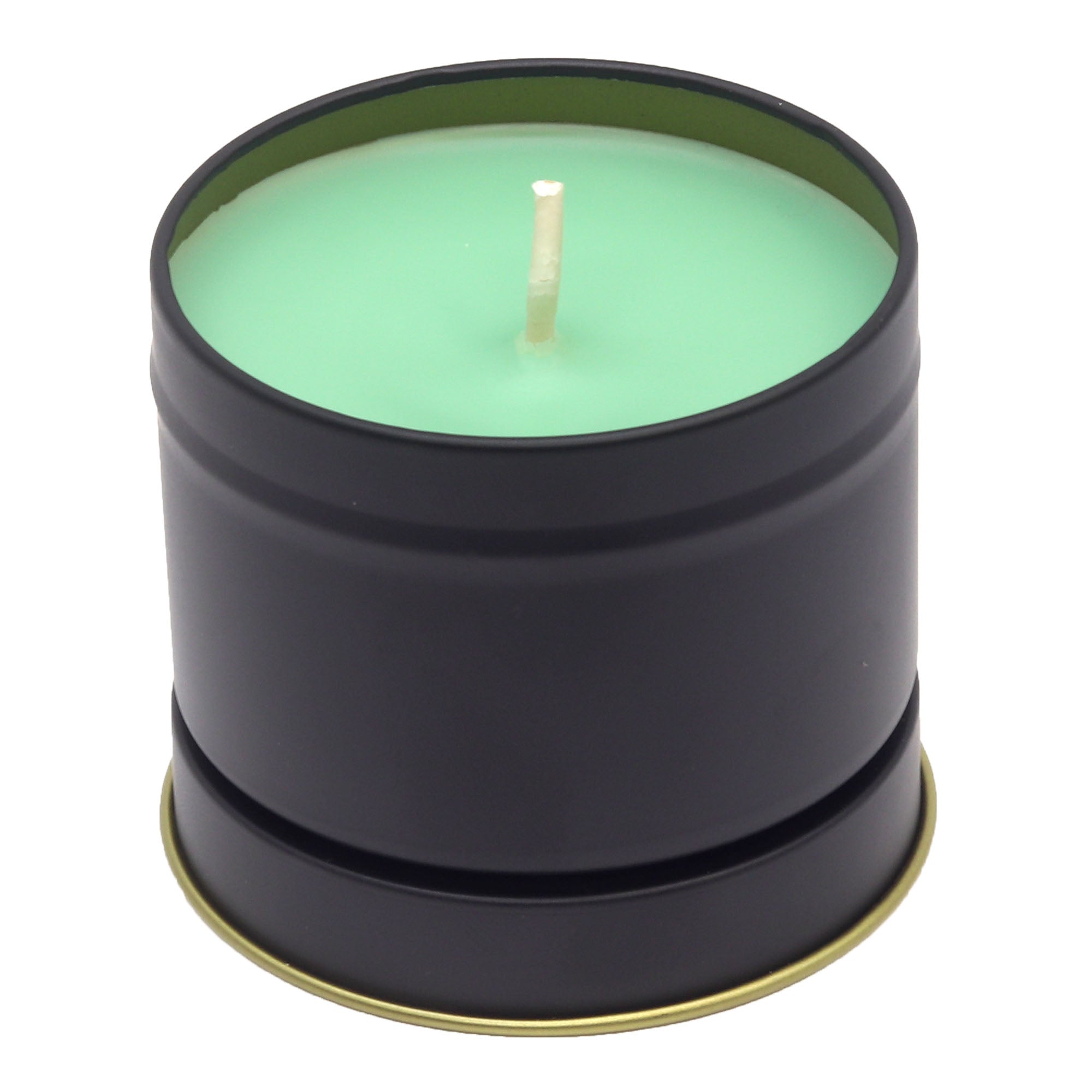 Green candle in a black tin with a gold base on a white background